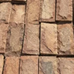 Камень пиленный красный